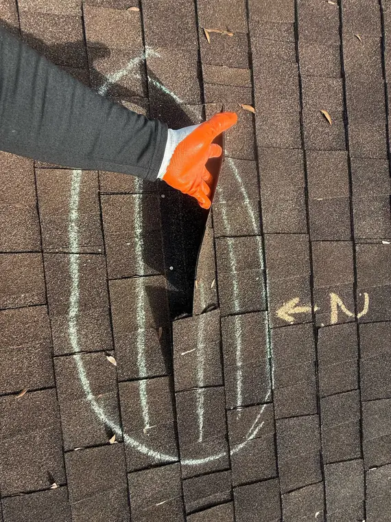 Close-up of a wind-creased shingle