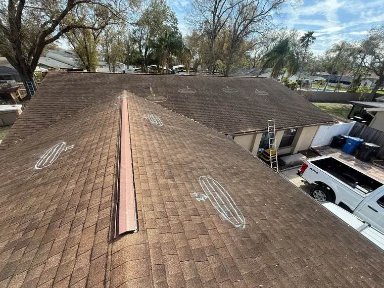 Ridge-line inspection documenting wind damage
